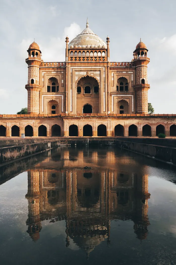 Heritage monument reflected in a still water channel, used as an outstation wedding location