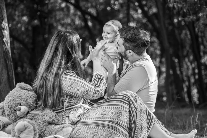 Mother and children photographed together in black and white