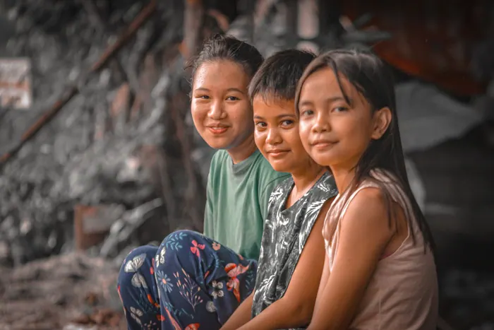 Children of an extended family gathered together for a group portrait