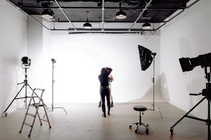 Studio set up with lights and backdrop before a portfolio shoot