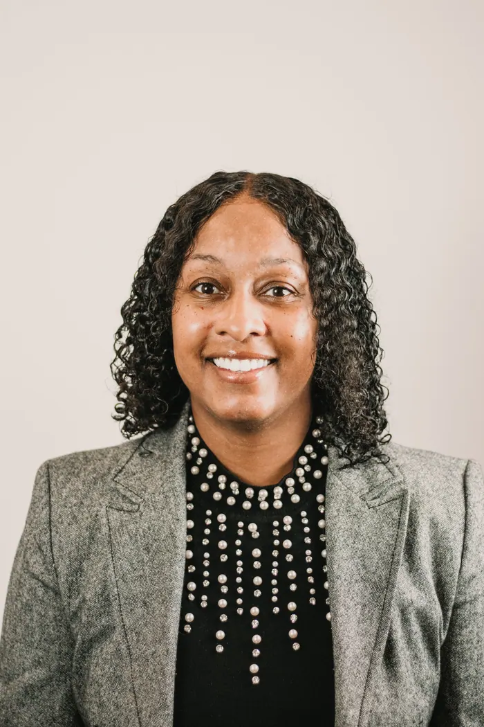 Headshot of a woman photographed for a company website
