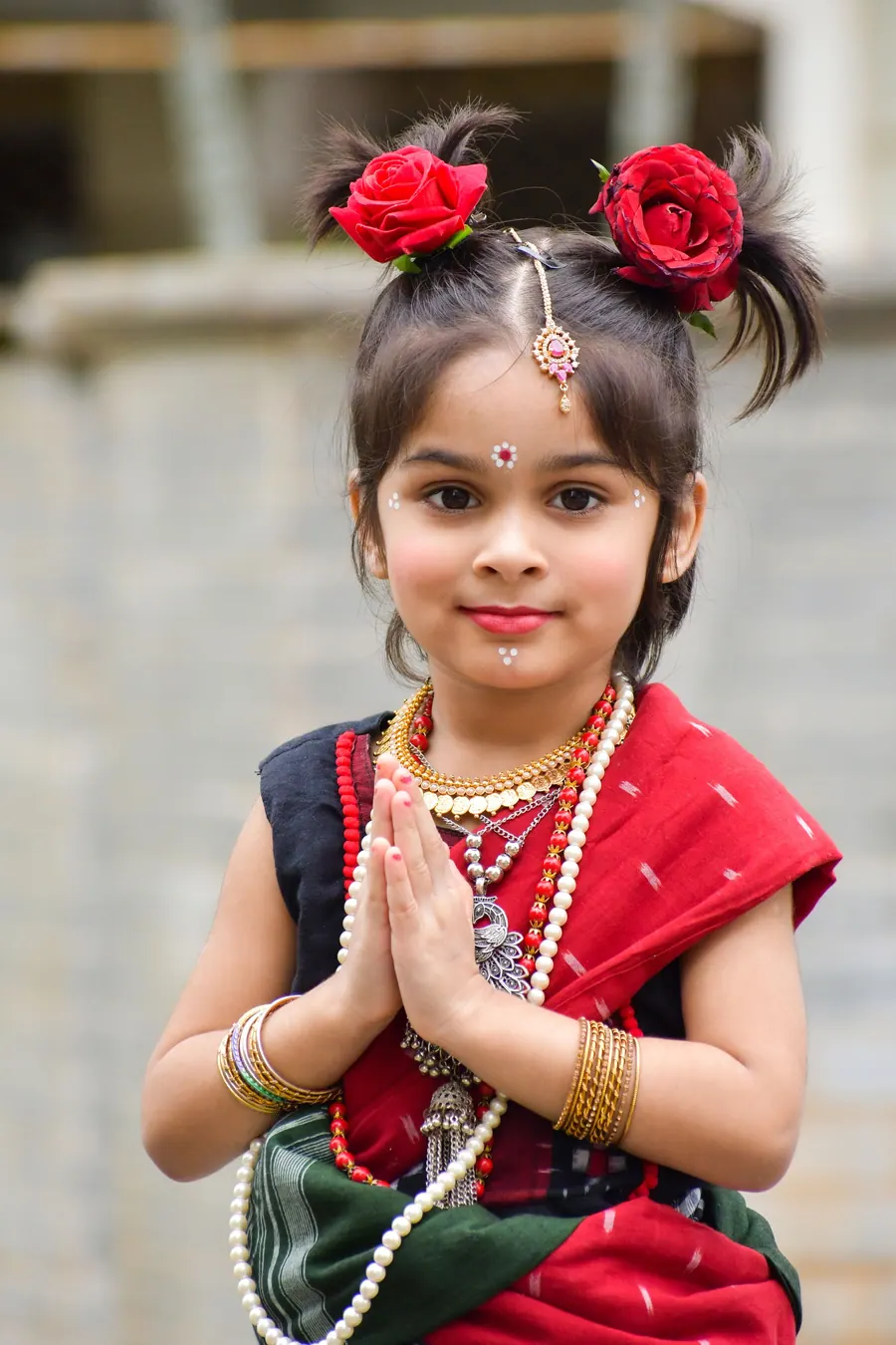Young girl in traditional dress and jewellery photographed in the studio