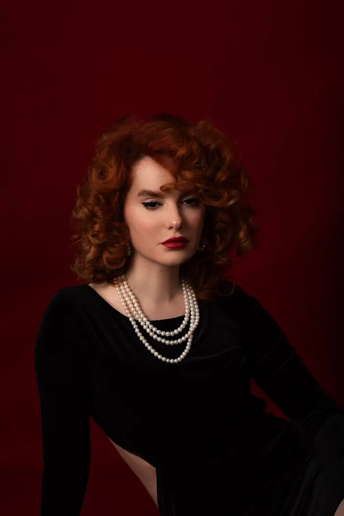 Studio portrait lit evenly on the face for a matrimonial profile